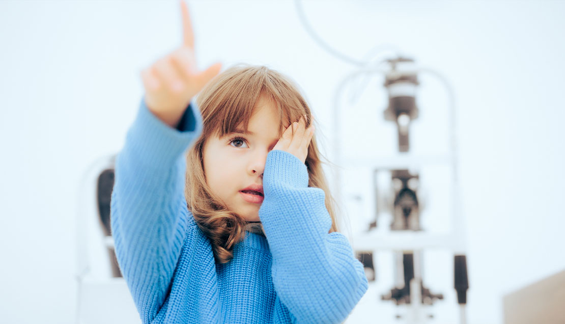 child doing an eye exam